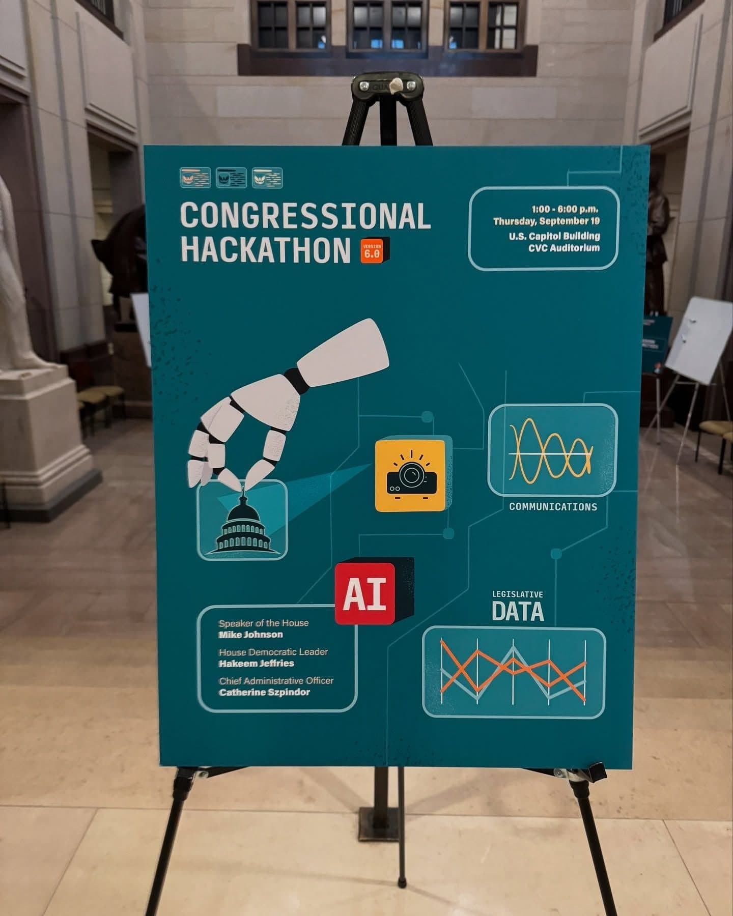 The Congressional Hackathon poster on an easel in the U.S. Capitol