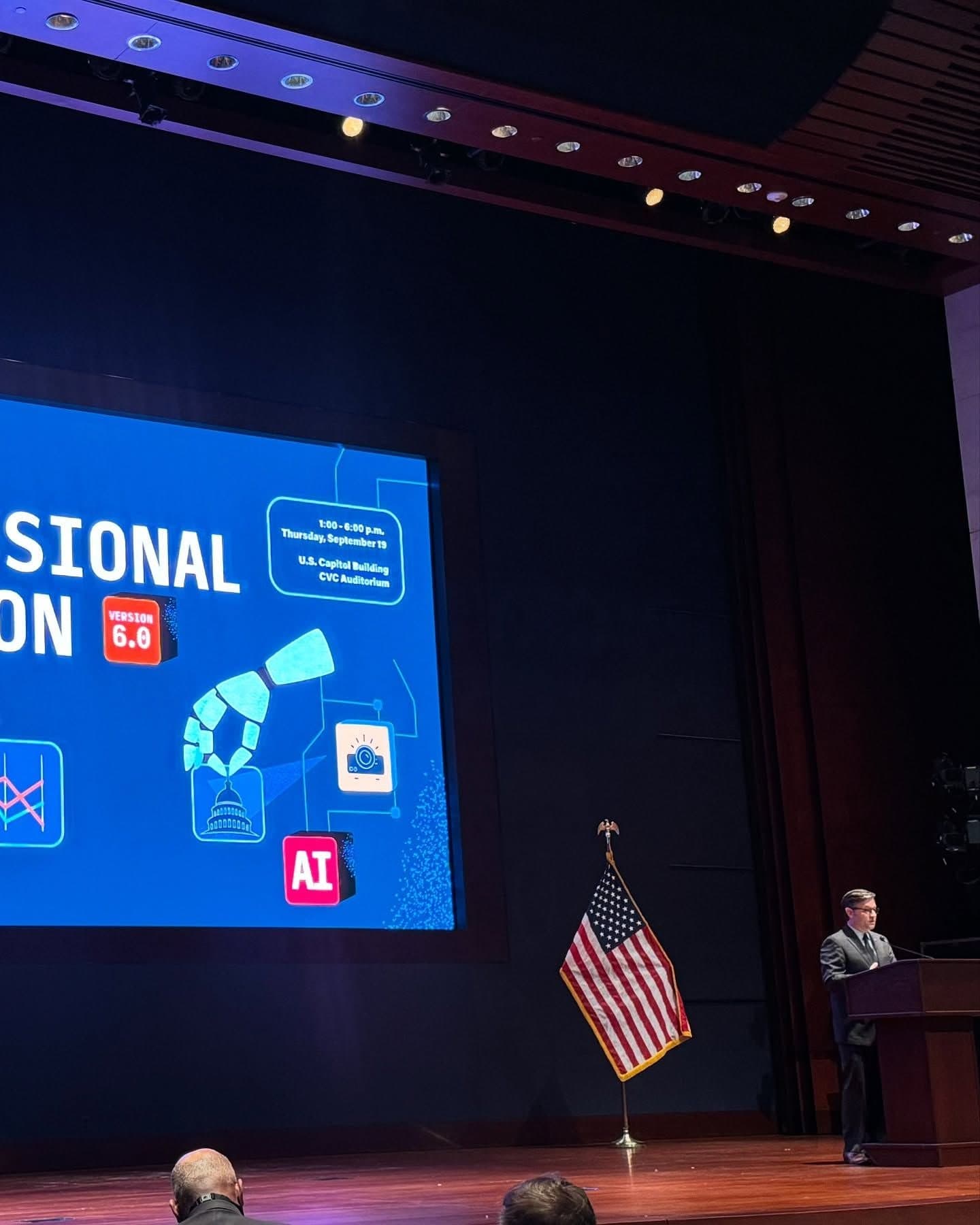 The Congressional Hackathon stage in the Capitol Visitor Center Auditorium, with Colin Raby at the podium